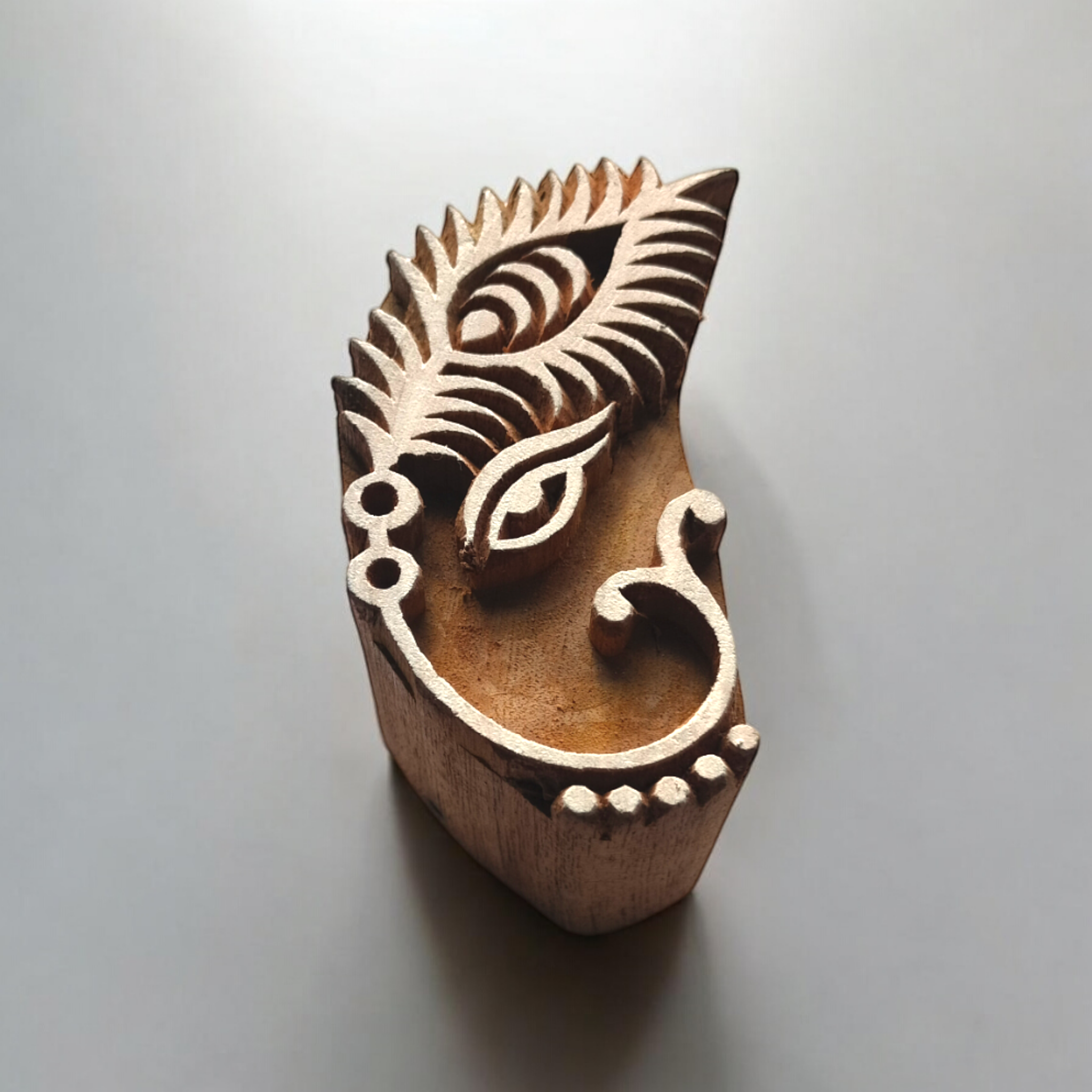 Handcrafted Wooden Printing Block โ Krishna Peacock Feather Design